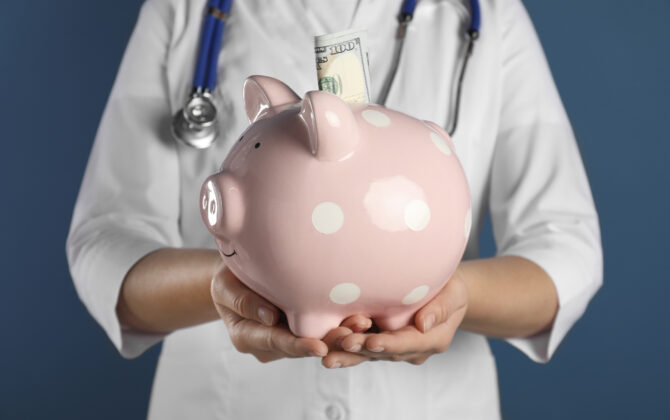 doctor-with-piggy-bank