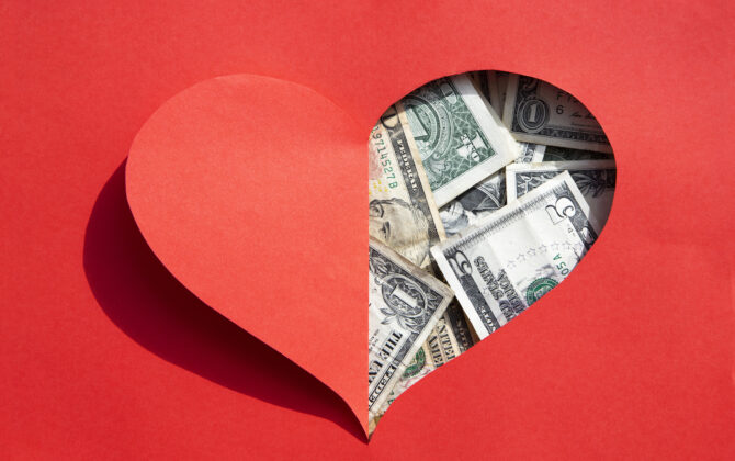 American Dollar Banknotes in red heart