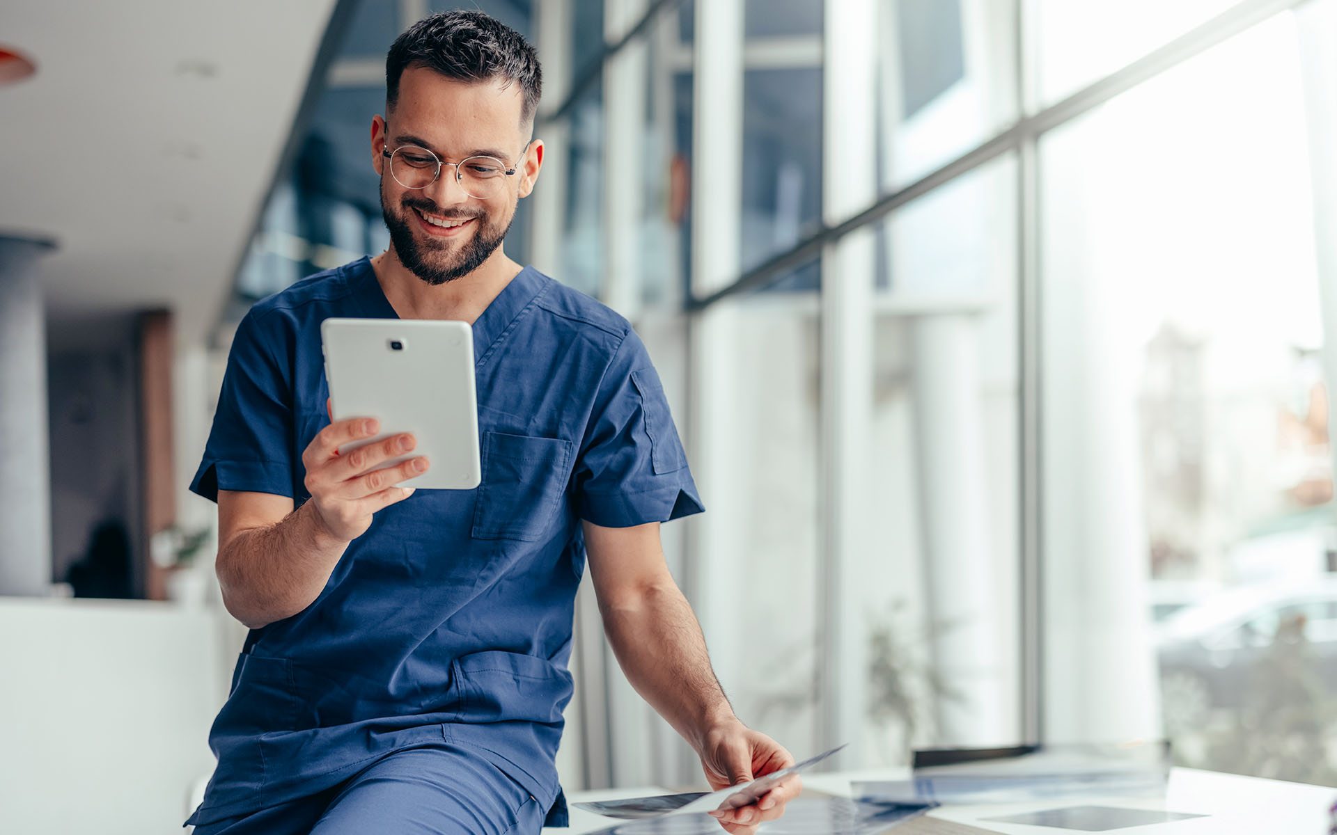 healthcare worker learning about student loan repayment assistance benefit