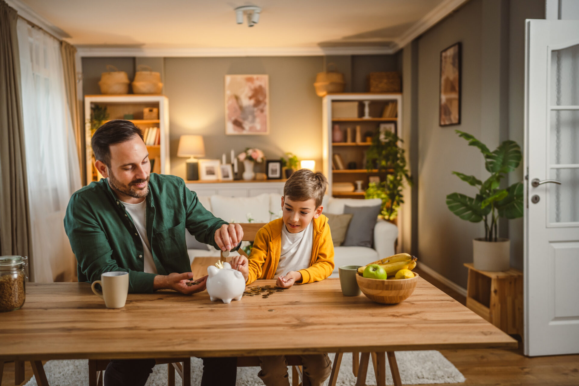 Father and son learn about high yield savings accounts